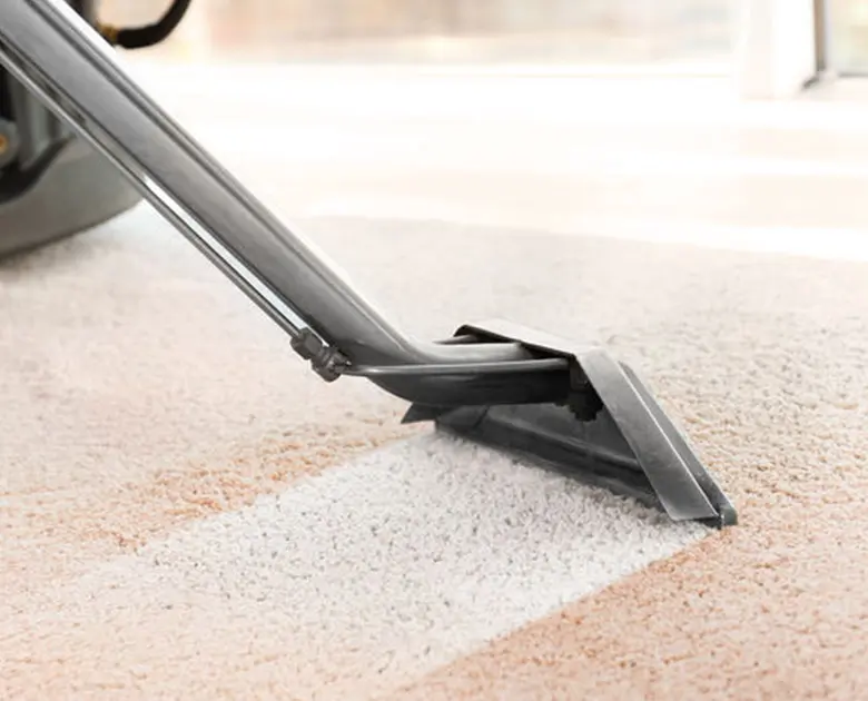 Carpet being steam cleaned closeup