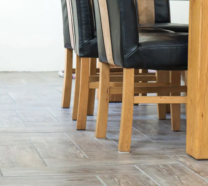 Wood chairs on tile floor
